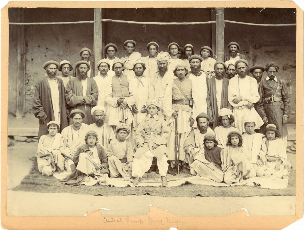 Photograph of uniformed men and boys